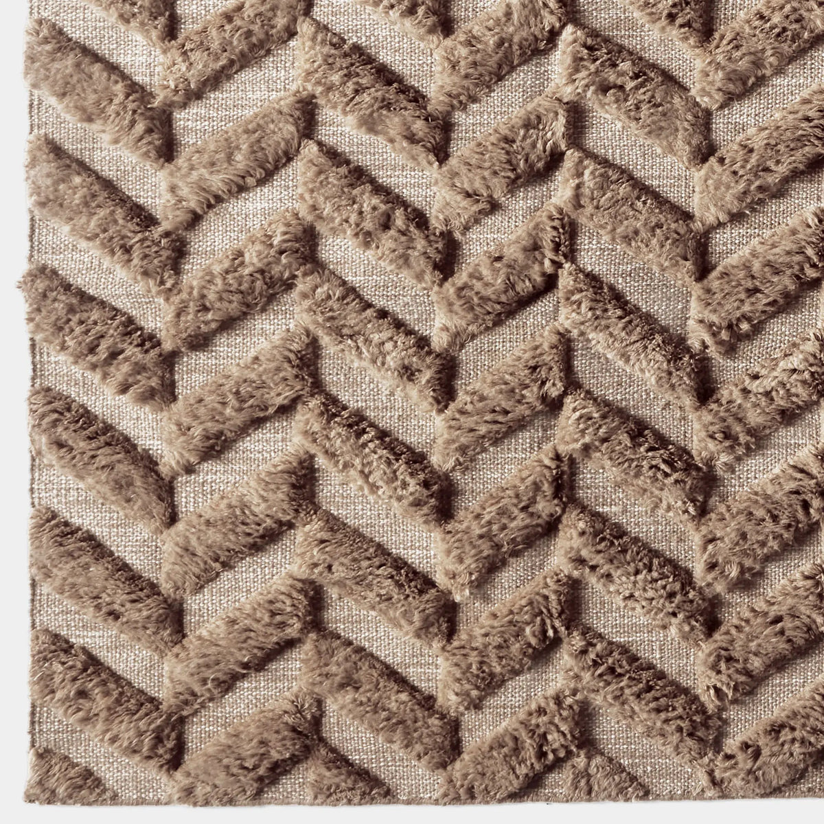 Close-up van de wollen visgraatstructuur